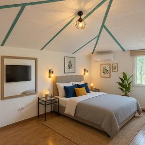 Ένα ή περισσότερα κρεβάτια σε δωμάτιο στο CTR Hacienda Guadalupe