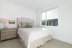 Ένα ή περισσότερα κρεβάτια σε δωμάτιο στο NEW Townhome-River Trail-Las Colonias-Dtown GJ! NO XTRA FEES!