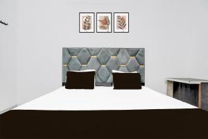Ένα ή περισσότερα κρεβάτια σε δωμάτιο στο Super Hotel O Galaxy Hotel