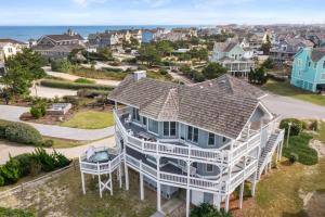 an aerial view of a large white house at Fergusons Flagship in Nags Head