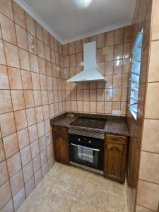 Kuchyňa alebo kuchynka v ubytovaní Apartamento muy cerca de la playa