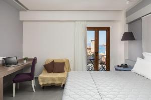 Postel nebo postele na pokoji v ubytování Dimitra Boutique Hotel