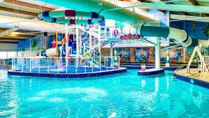 an indoor water park with a water slide and slides at K&S at 1529 in Selsey