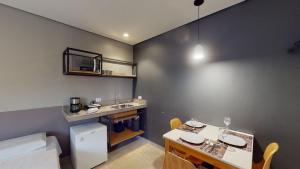 Η κουζίνα ή μικρή κουζίνα στο Apartamento 4 Pinheiros Incrível