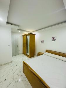 En eller flere senge i et værelse på Fanadir bay compound + 15 billeder