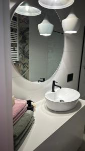 Kúpeľňa v ubytovaní Apartament Pastelowa Portova