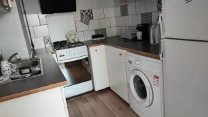 Η κουζίνα ή μικρή κουζίνα στο Mieszkanie blisko plaży Jelitkowo