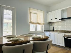 Kuchyň nebo kuchyňský kout v ubytování Apartamento en Camariñas 2