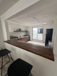 Kuchyň nebo kuchyňský kout v ubytování Margaritas Cincuenta + 2 fotografie