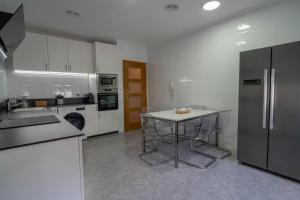 Kuchyňa alebo kuchynka v ubytovaní Apartamento Sarmiento- Casco histórico Mondoñedo