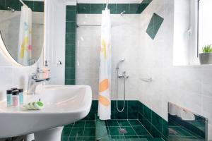 Ένα μπάνιο στο Armonia Apartments +106 φωτογραφίες