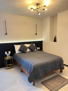 Postel nebo postele na pokoji v ubytování HOTEL BOUTIQUE ÁRBOL De LA VIDA + 62 fotografií