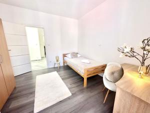 Postel nebo postele na pokoji v ubytování Apartman Niko