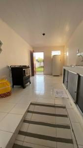 Kuchyň nebo kuchyňský kout v ubytování Quarto Casal Bougainville 2
