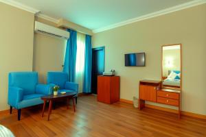 TV in/ali zabaviščno središče v nastanitvi PYramiDS OaSiS ViEW HoTeL