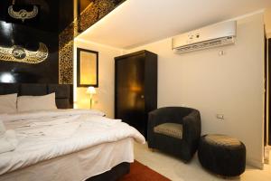 Katil atau katil-katil dalam bilik di Giza Inn view