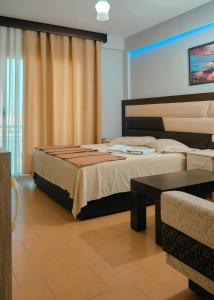 Giường trong phòng chung tại Hotel Center Park