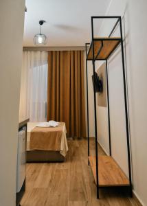 Giường trong phòng chung tại Hotel Center Park