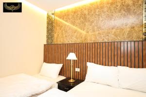 Katil atau katil-katil dalam bilik di Giza Inn view