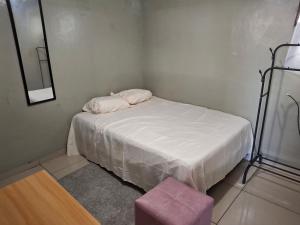 Ένα ή περισσότερα κρεβάτια σε δωμάτιο στο Apartamento +4 φωτογραφίες