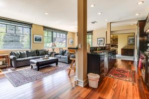 a living room with a couch and a table at Less Than 1 Mi to Sun Valley Resort Dtwn Ketchum Condo in Ketchum