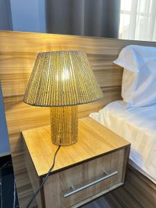 Uma cama ou camas num quarto em Azure Villa Suites Apart Hotel