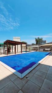 Swimmingpoolen hos eller tæt på Apartamento Completo Rio Verde