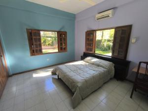 Katil atau katil-katil dalam bilik di Gran casa quinta y apartamentos ideal para grupos