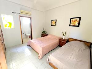 Katil atau katil-katil dalam bilik di Gran casa quinta y apartamentos ideal para grupos +9 gambar