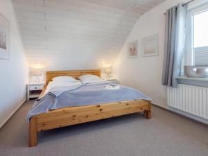 Letto o letti in una camera di Strandwind