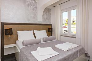 Posteľ alebo postele v izbe v ubytovaní Apartment Zecevo Rtic 8366d