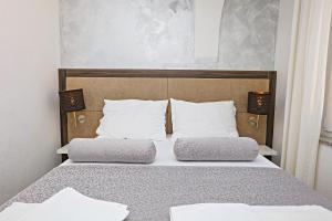 Posteľ alebo postele v izbe v ubytovaní Apartment Zecevo Rtic 8366d