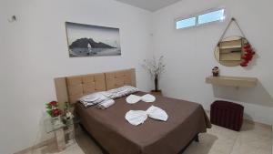 En eller flere senge i et værelse på Casa ah temporal + 42 billeder