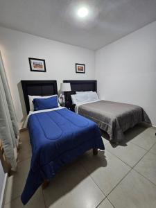 Postel nebo postele na pokoji v ubytování Casa Coruña in Durango