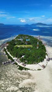 an island in the middle of the ocean at Adefiro homestay in Waisai