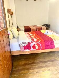 Casa Cusco guest house客房内的一张或多张床位