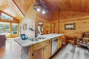 a kitchen with wooden walls and a wooden ceiling at Time Out in Blue Ridge +17 photos