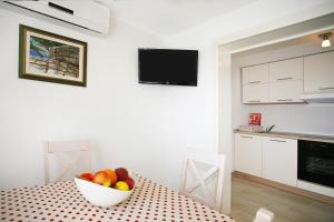 Kuchyň nebo kuchyňský kout v ubytování Holiday Home Miklica