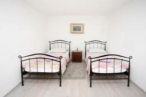Postel nebo postele na pokoji v ubytování Holiday Home Miklica