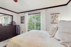 Letto o letti in una camera di Tiptop Treehouse