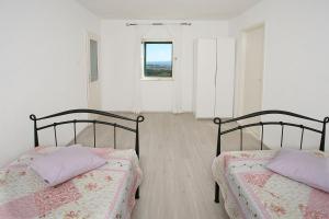 Postel nebo postele na pokoji v ubytování Holiday Home Miklica