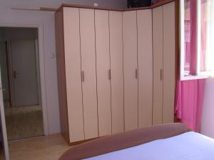 Łóżko lub łóżka w pokoju w obiekcie Apartment ML