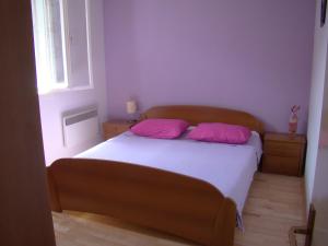 Posteľ alebo postele v izbe v ubytovaní Apartment ML