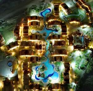 an aerial view of a resort at night at Búzios Beach Resort Apartamento Luxo Home Premium 2 in Búzios