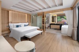 Voodi või voodid majutusasutuse Centara Villas Phi Phi Island toas