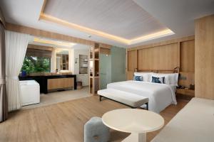 Voodi või voodid majutusasutuse Centara Villas Phi Phi Island toas
