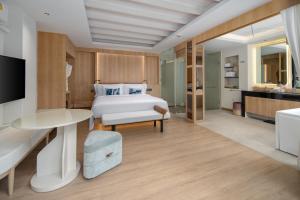 Voodi või voodid majutusasutuse Centara Villas Phi Phi Island toas