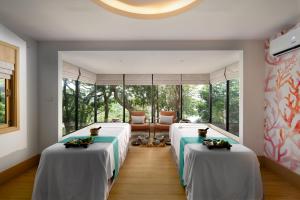 Voodi või voodid majutusasutuse Centara Villas Phi Phi Island toas