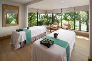 Voodi või voodid majutusasutuse Centara Villas Phi Phi Island toas