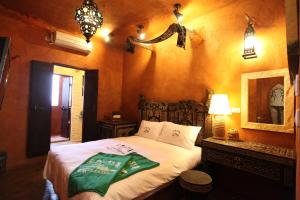 Postel nebo postele na pokoji v ubytování Jialeshuel Surf house B&B